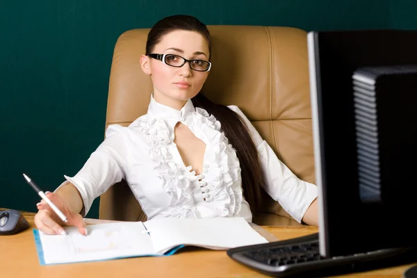 Professional woman working in office