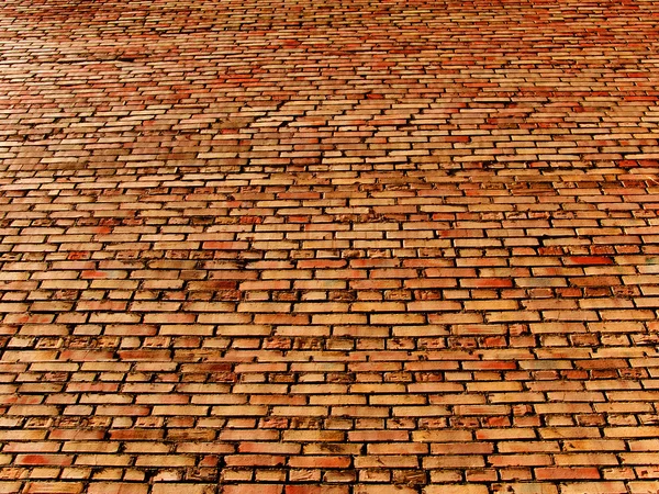 Brick and a wall laying