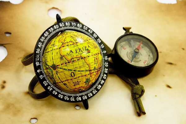 Old globe and compass