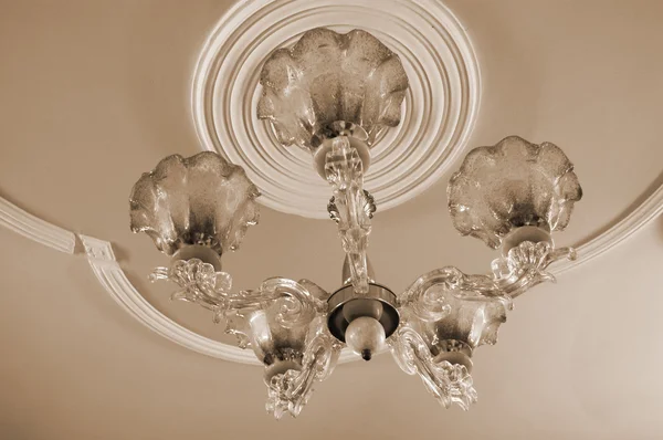 Chandelier with lights sepia — Stock Photo #1637462