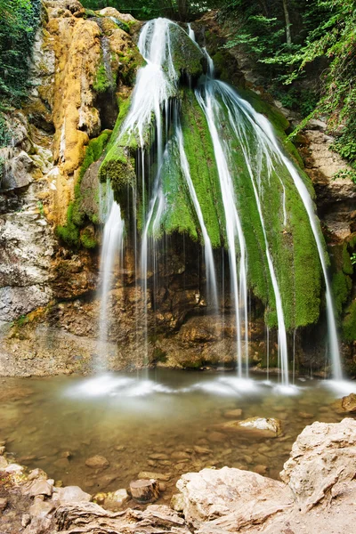 Beautiful waterfall in mountain wood — Stock Photo #2078964