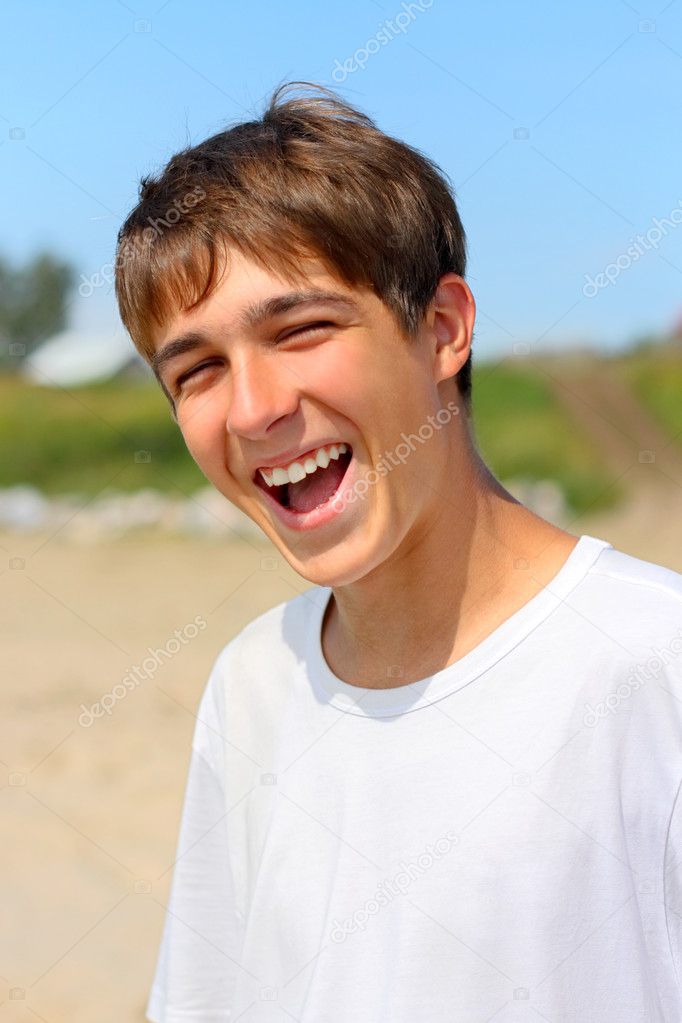 Happy teenager on the beach