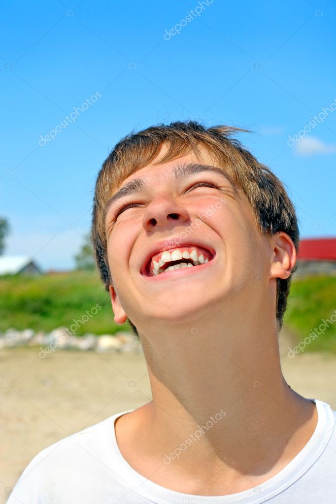 Happy teenager on the beach