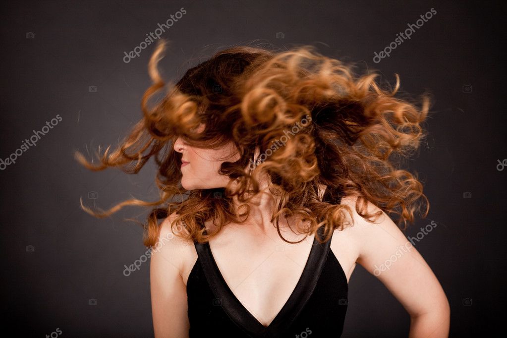 Hair flick by young model in