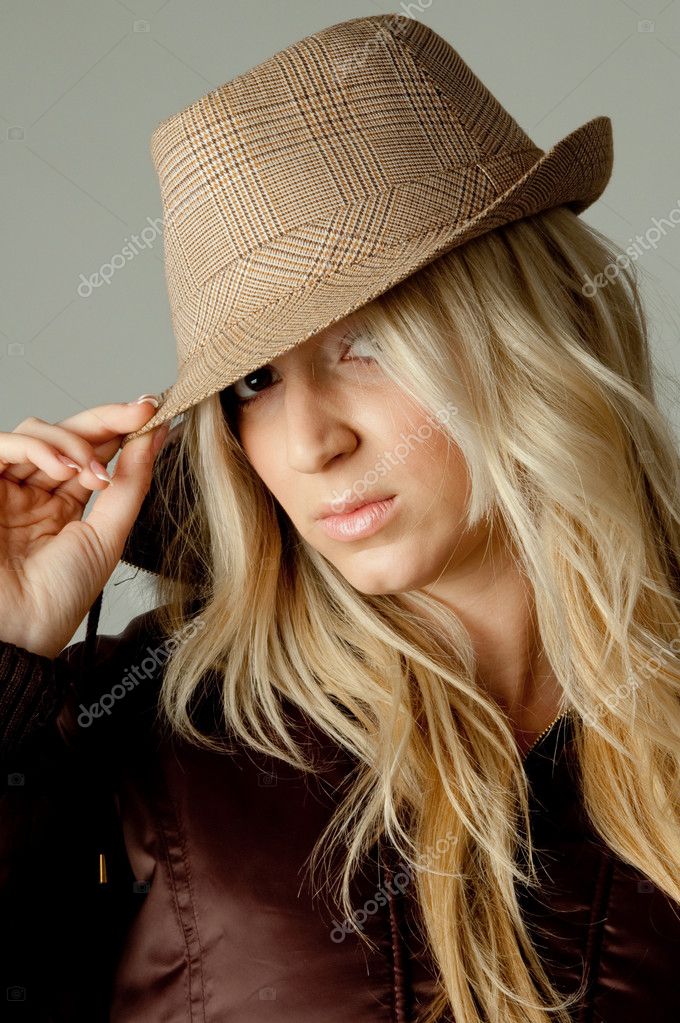 Woman Holding Hat