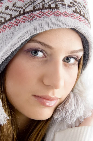 Attractive face of female wearing cap