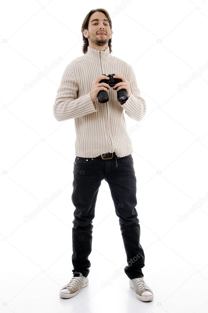 holding binoculars