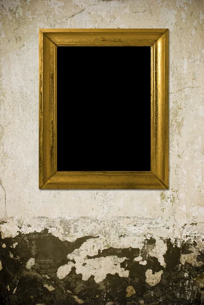 Old grunge wall with vintage frame