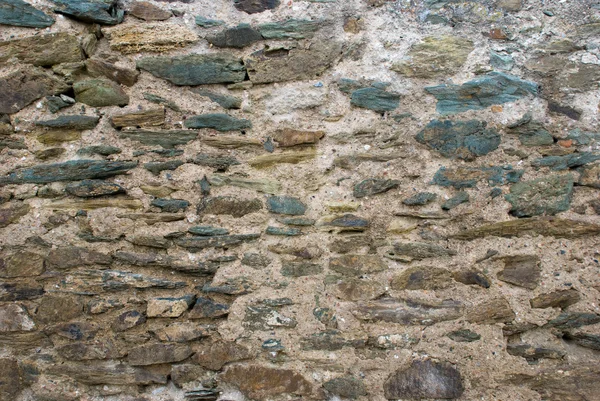 Closeup view of the old stone wall