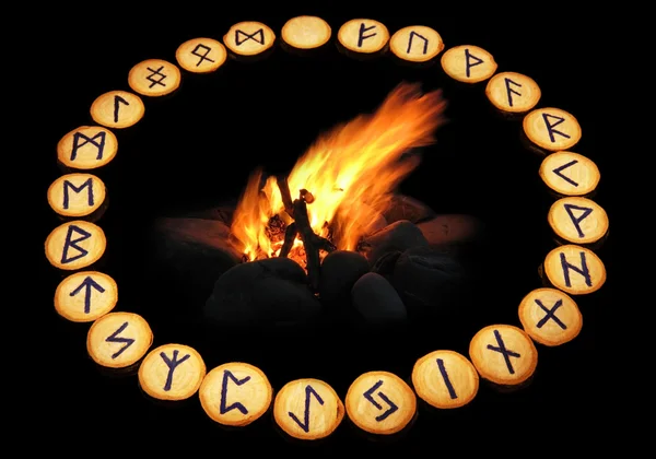 Runes around fire on black background