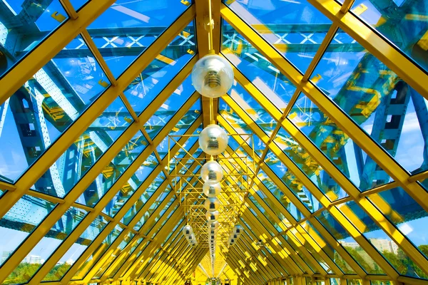 Yellow abstract ceiling in office