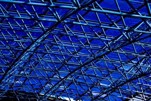 Blue abstract ceiling in office