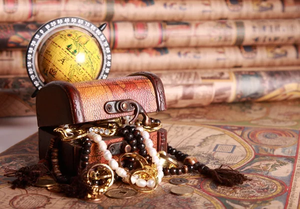 Chest , jewelry, globe, antique map