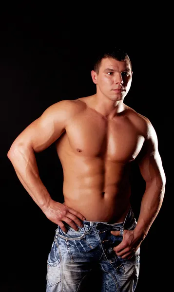 Handsome muscular guy posing