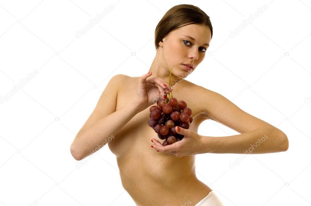 Beautiful naked girl with bunch of juicy grape