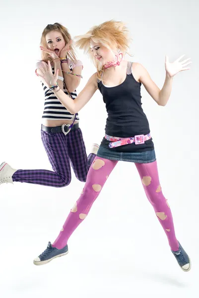 Two jumping punk girls