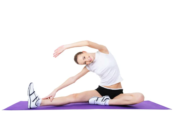 Woman doing aerobic exercises by Vitaly Valua Stock Photo