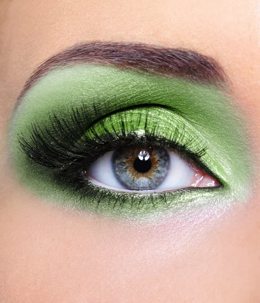 Green make-up of woman eye