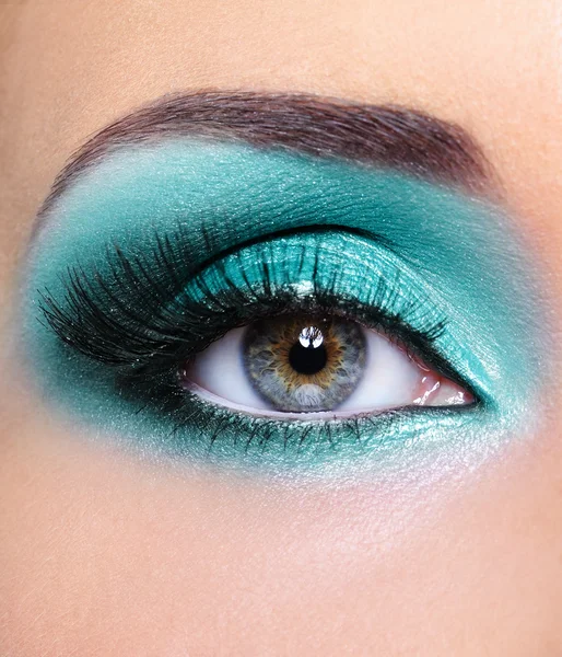 Turquoise glamour make-up of woman eye