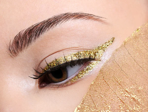 Golden fashion eye make-up