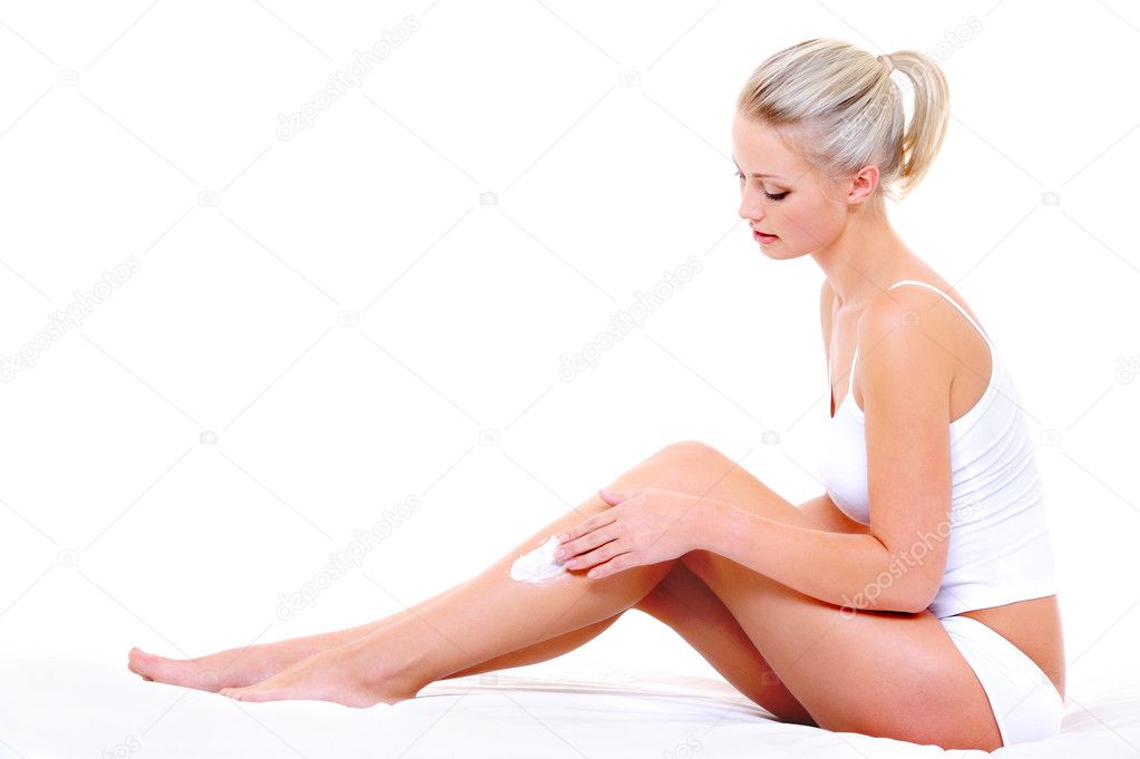 Woman Applying Cream On Legs Stock Photo Valuavitaly 1520141