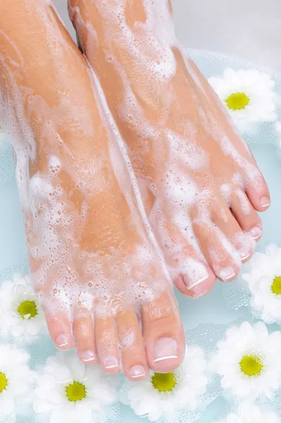 Spa treatment of a beautiful female feet