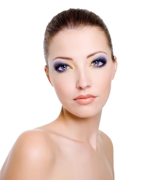 Woman face with fashion makeup by Vitaly Valua Stock Photo
