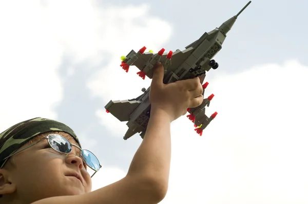 Little boy and war-plane