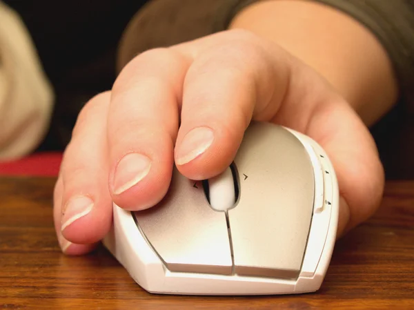 Human hand using scroll wheel on mouse