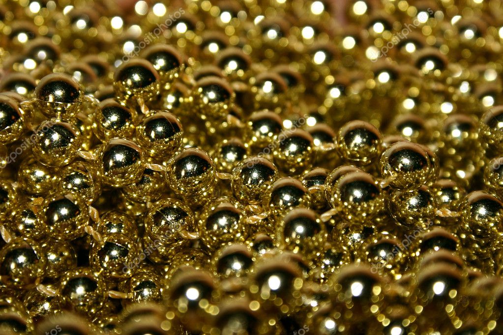 Gold beads — Stock Photo © Evgeni #1512462