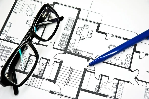 Apartment Plan with pencil and glasses