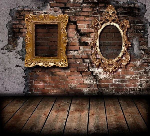 Vintage frame on a brick wall of the old