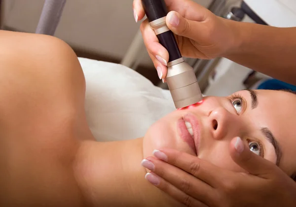 Woman getting skin cleaning