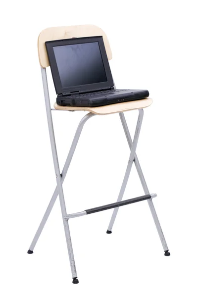 Open standing on bar chair laptop