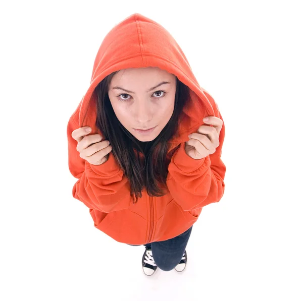 Standing girl in orange sweatshirt