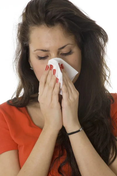 Woman sneezing in the handkerchief — Stock Photo #2252900