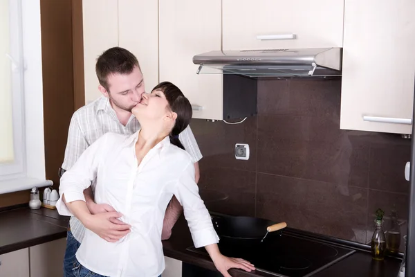 Couple in kitchen