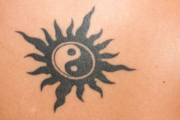 Tattoo Jing Jang symbol by wojciech kaczkowski Stock Photo