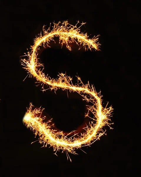 Letter S made of sparklers isolated