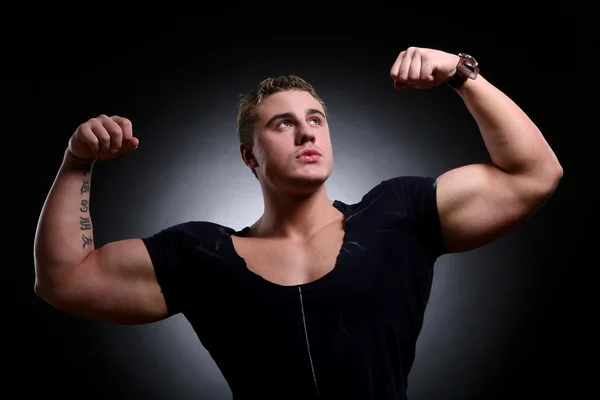 Young and beautiful muscle man
