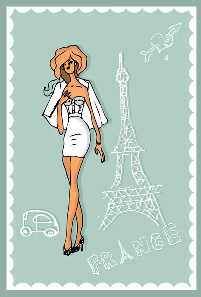 Woman in white dress with the Eiffel tower on th