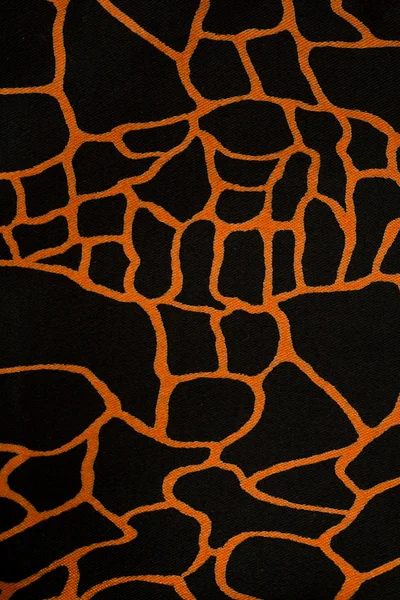 Black fabric cloth with orange pattern