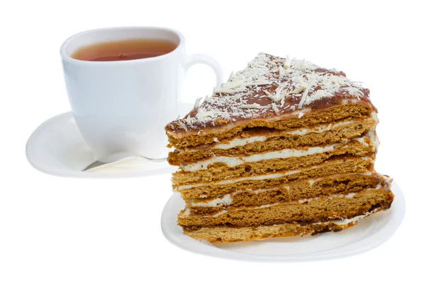 Piece of honey cake and tea cup
