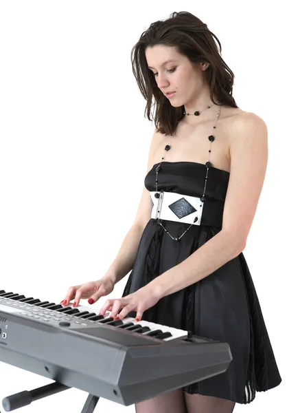 Young women playing piano