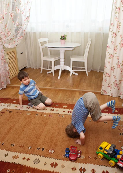 Children plays on a floor