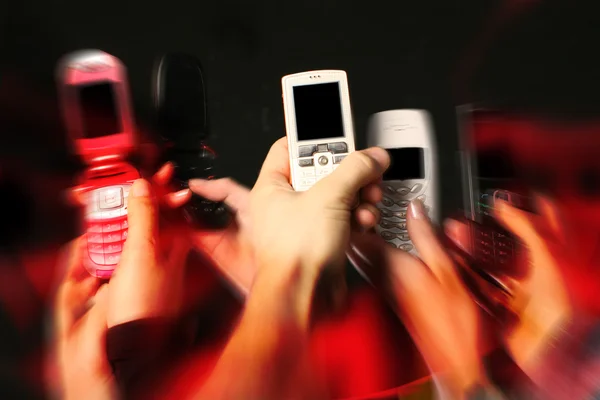 Cell phones in hands