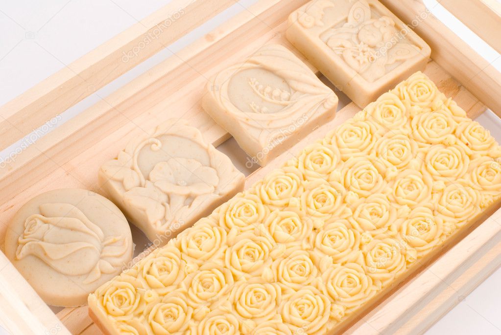 Handmade soap in wooden box as gift - Stock Image