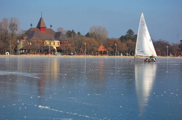 Sailing on frozen lake, winter, sport