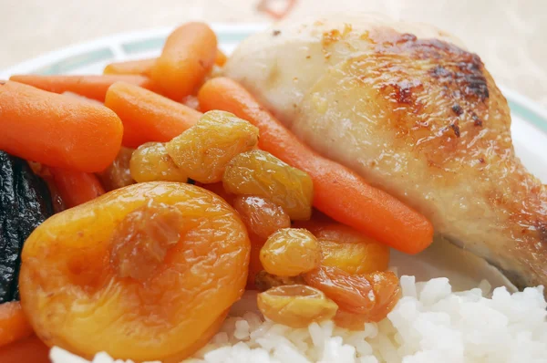 Stewed carrots with rice and chicken