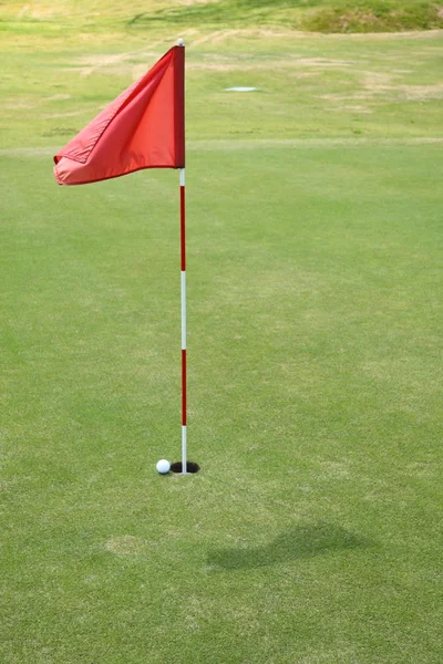 Flag on golf course.